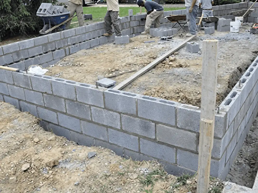 Professionals building a foundation with blocks in Sioux Falls, SD