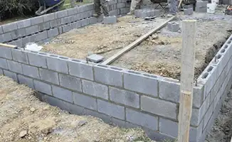 Professionals building a foundation with blocks in Sioux Falls, SD