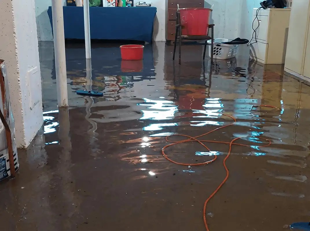 Basement with boiler, cabinets and washing machine completely flooded in Sioux Falls, SD