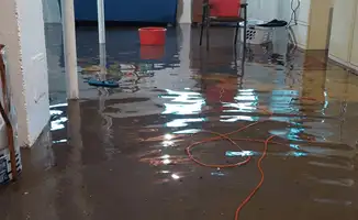 Basement with boiler, cabinets and washing machine completely flooded in Sioux Falls, SD